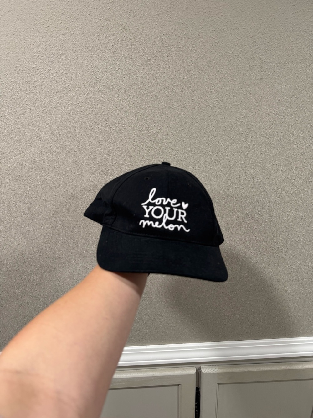 Love your melon black hat